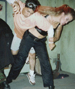 Christopher Morrison getting thrown by Cara Gilson in Impact's production of Zay Amsbury's The Wake Up Crew. Fights by Christopher Morrison.