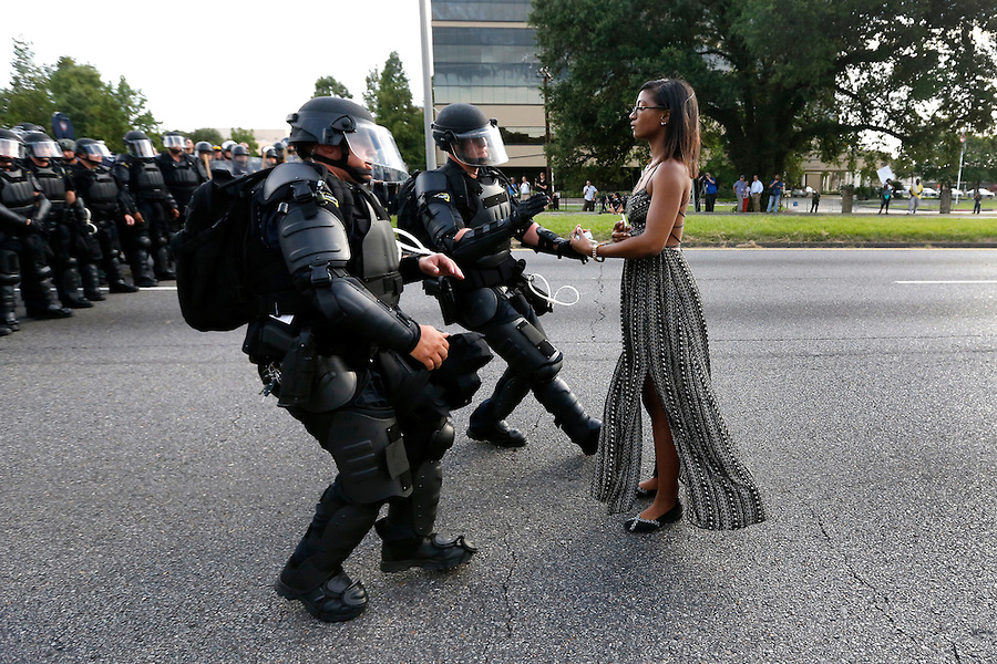 Demonstrators protesting the shooting death of Alton Sterling gather near the headquarters of the police department in Baton Rouge, Louisiana